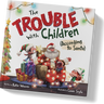 Children's book titled "The Trouble With Children (According to Santa)" shown at an angle on a white background. The cover features colorful holiday illustrations including Santa, children, gifts, and Christmas lights.